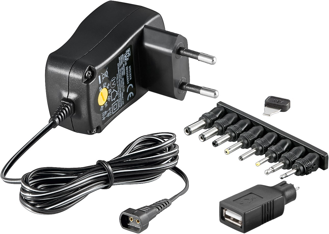 64571  Alimentador Universal 3-12V  7,2W 0,6A  7 Conectores DC + USB-A, USB Mini-B, Micro-USB